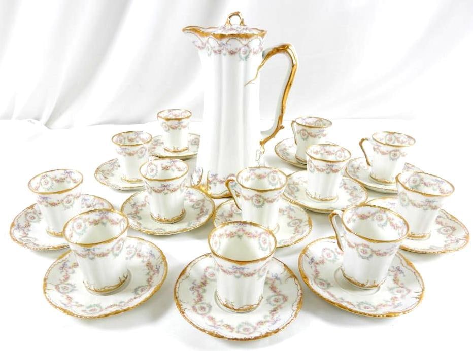 Antique Limoges Theodore Haviland France 25 piece tea set svc. for 12.: Limoges Theodore Haviland 25-piece Porcelain hand painted tea set with 9" tall teapot with 12 teacups and 12 saucers. This is in EXCELLENT CONDITION. No chips, no cracks, no crazing, no paint loss and