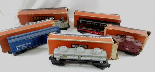 LOT OF 5 LIONEL trains in boxes, 6357, 3562, 6468, 6414, and 6415