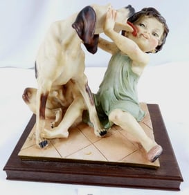 Vintage Giuseppe Armani figurine titled "II Mio Baby" (My Bobby) depicting a girl and her dog,