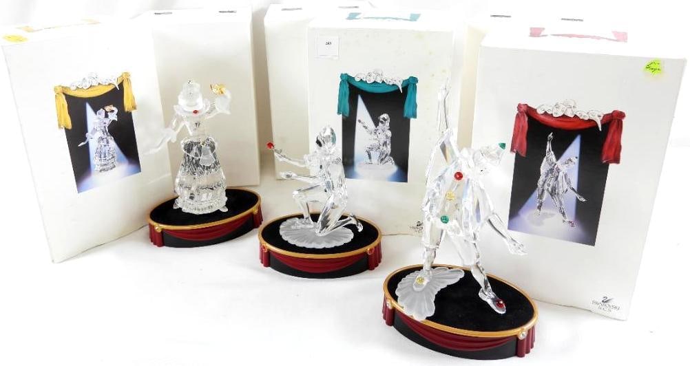 LOT OF 3 SWAROVSKI CRYSTAL "Masquerade" figures with boxes, certificates, and stands: LOT OF 3 SWAROVSKI CRYSTAL "Masquerade" figures with boxes, certificates, and stands, Columbine 2000, Harlequin 2001, and Pierrott 1999 Swarovski collector society. Adi Stocker, Anton Hirzinger and Ga