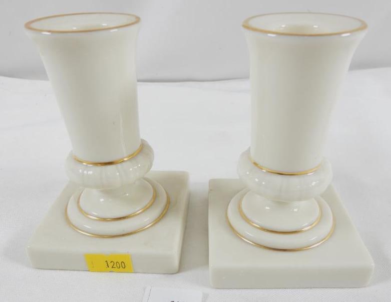 Set of 2 LENOX ivory-colored porcelain candlesticks with gold trim: Set of 2 LENOX ivory-colored porcelain candlesticks with gold trim, design includes a square base with ribbed ring around the steam and part of the Lenox Windsor Collection Gold pattern, made in USA,
