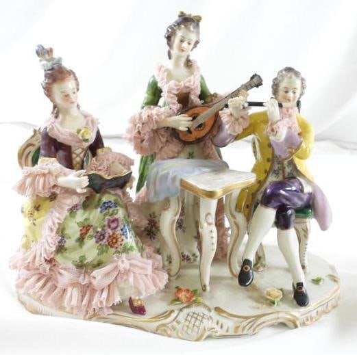 ANTIQUE DRESDEN LACE figurine with woman singer, woman playing instrument and man sitting with: ANTIQUE DRESDEN LACE figurine with woman singer, woman playing instrument and man sitting with instrument, 9.5" long, 9" tall and 6" wide