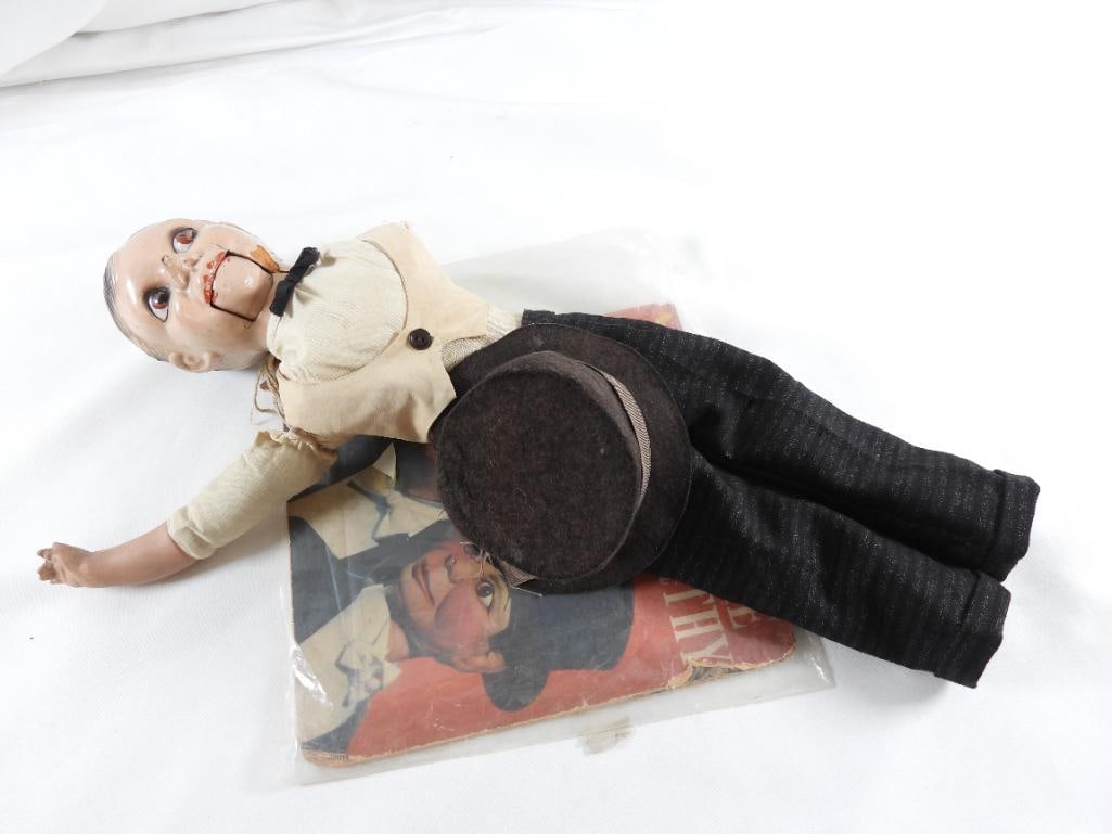 CHARLIE MCCARTHY 19" doll with book and hat: CHARLIE MCCARTHY 19" doll with book and hat, composition face head shows wear.