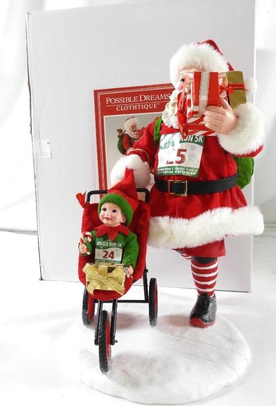POSSIBLE DREAMS CLOTHTIQUE Jingle Run Santa NIB: Dept 56 POSSIBLE DREAMS CLOTHTIQUE Jingle Run Santa with a baby elf in a 3 wheeled stroller.#6006029. New in original white box. Never displayed. 11"tall x 6" wide base