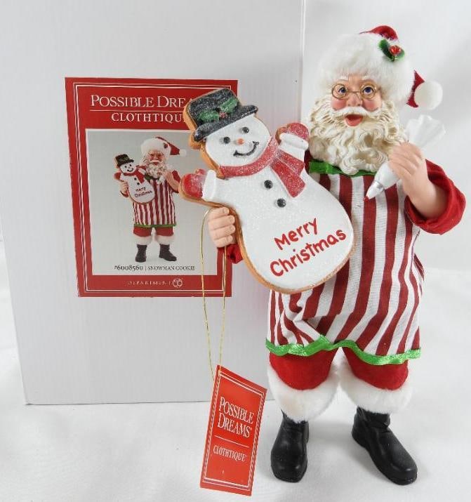 POSSIBLE DREAMS CLOTHTIQUE Snowman Cookie Santa NIB: Dept 56 POSSIBLE DREAMS CLOTHTIQUE Snowman Cookie Santa holding a Giant snowman cookie with Merry Christmas writing on the cookie. #6008560. New in the original white box. Never displayed. Dimensions: