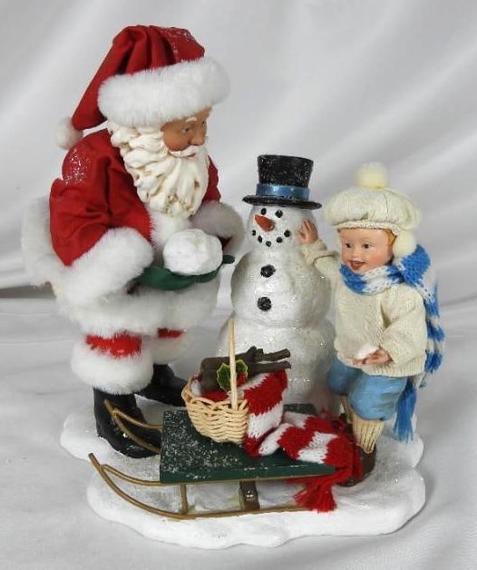 POSSIBLE DREAMS CLOTHTIQUE Snowball Buddies: Dept 56 POSSIBLE DREAMS CLOTHTIQUE Snowball Buddies 2001 Figure with Santa and girl making snowman and a sled with supplies 9.5"Tx8"Lx6.5"W