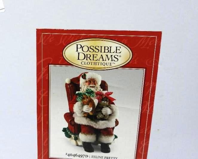 POSSIBLE DREAMS CLOTHTIQUE Feline Pretty NIB: Dept 56 POSSIBLE DREAMS CLOTHTIQUE Feline Pretty #4046497D Santa holding two cats with bows in chair. New in original white box. Dimensions: 9.5"Tx5"Lx6"W