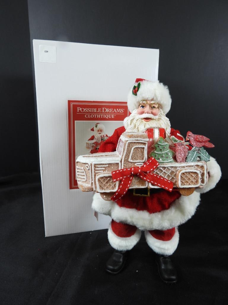 POSSIBLE DREAMS CLOTHTIQUE Tailgate Party Santa: Dept 56 POSSIBLE DREAMS CLOTHTIQUE Tailgate Party Santa holding Gingerbread truck with items #6011849. New in original white box. Never displayed. Dimensions: 12"Tx6.5"Lx5.5"W