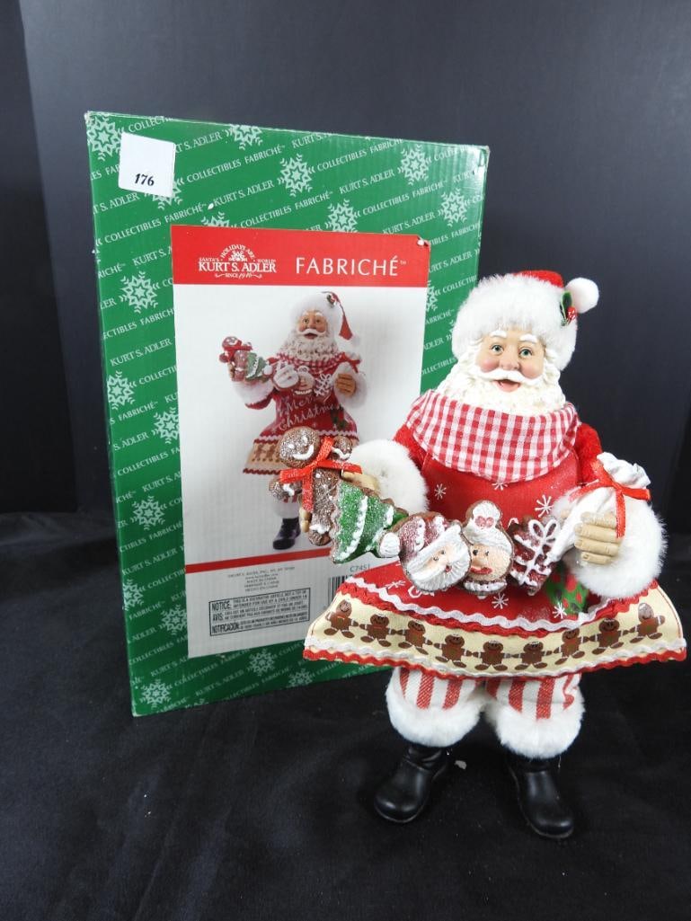 KSA FABRICHE KURT ADLER Santa with cookies C7451: KSA FABRICHE KURT ADLER Santa with string of cookies, C7451, solid resin, in original box. Dimensions: 12"Tx7"Lx4.5"W