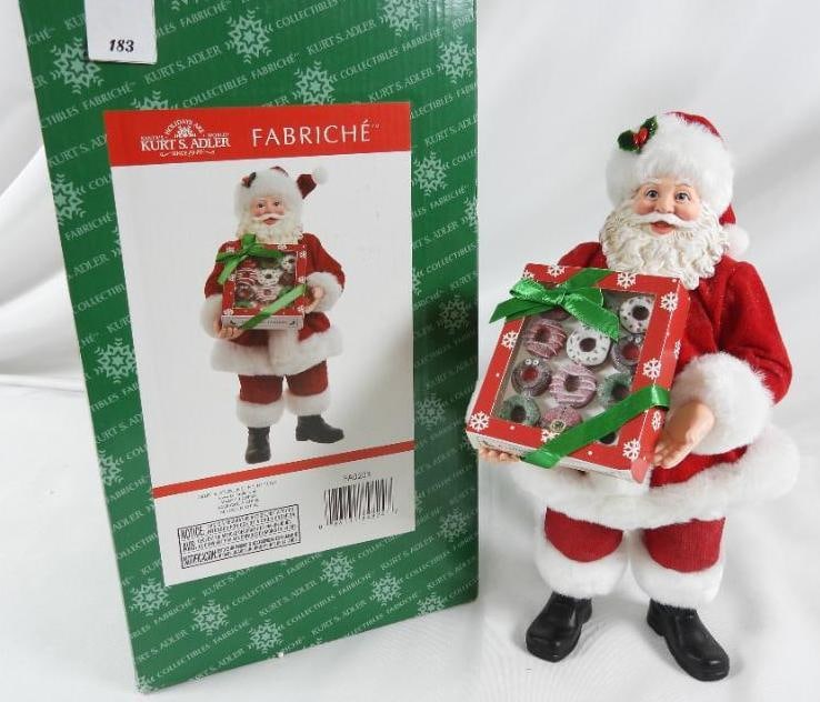 KSA FABRICHE KURT ADLER Santa with donuts FA0203: KSA FABRICHE KURT ADLER Santa with box of donuts FA0203 in original box. Solid resin. Dimensions: 11"Tx5.5"Lx6"W