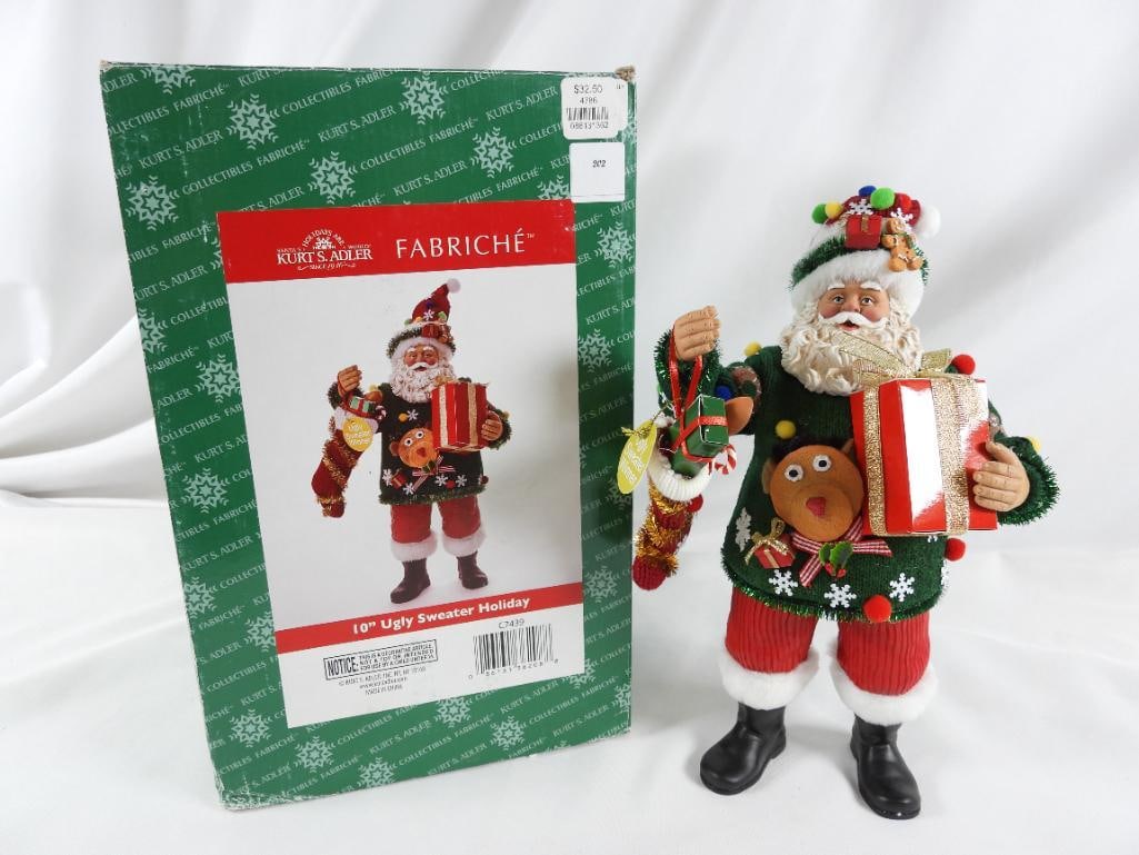 KSA FABRICHE KURT ADLER Ugly Sweater Santa: KSA FABRICHE KURT ADLER 10" Ugly Sweater Holiday Santa C7439 in original box. Dimensions: 12.5"Tx7"Lx5"W