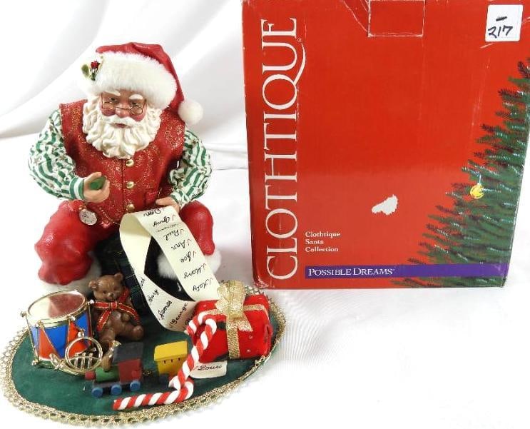 POSSIBLE DREAMS CLOTHTIQUE A Generous Gent Santa: POSSIBLE DREAMS CLOTHTIQUE A Generous Gent Santa sitting with green pencil and list and green carpet of toys. In original red box. Dimensions: 9"Tx8"Lx9"W
