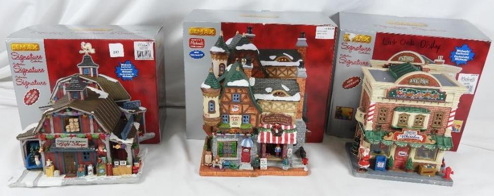 LOT OF 3 LEMAX SIGNATURE COLLECTION Shops: LOT OF 3 LEMAX SIGNATURE COLLECTION Shops: Bells and Whistles Christmas D?cor #55989, 7"Lx5"Wx8"T Olde World Wooden Toys #15798, 8"Lx4"Wx8.5"T Country Barn Gift Shop #35536, 8.5"Lx5"Wx7"T