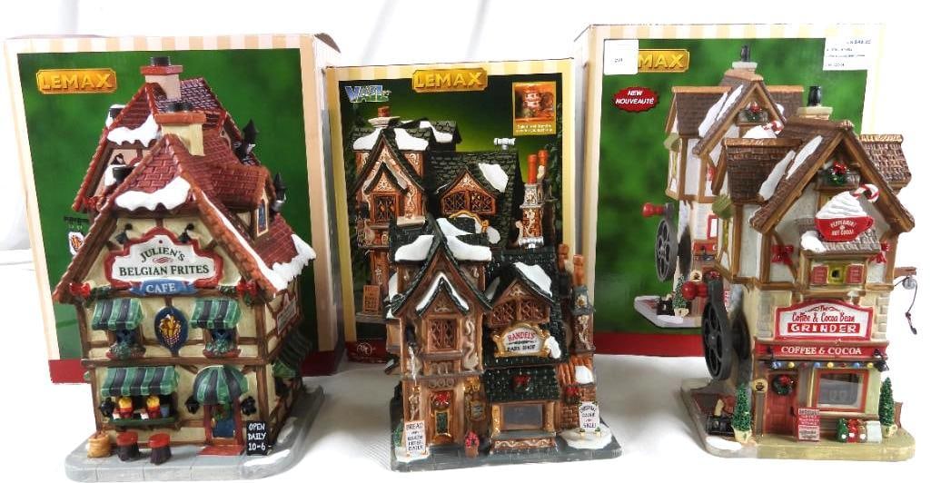 LOT OF 3 LEMAX lighted buildings in original boxes: LOT OF 3 LEMAX displays in original boxes: Handel's Bake Shop #45019, 5.5"Lx4"Wx6"T, Julien's Belgian Frites Caf? #85371, 5"Lx4.75"Wx9"T, Coffee & Cocoa Bean Grinder, #15780, 4.5"Lx3.75"Wx9"T