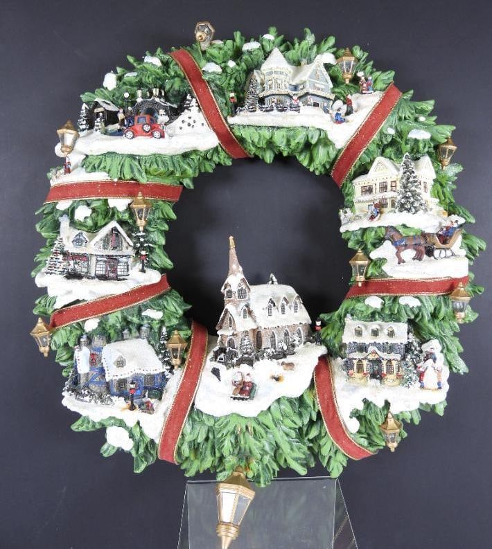 THOMAS KINKADE LIGHTED Christmas Village Wreath: THOMAS KINKADE LIGHTED Christmas Village Wreath with glitter accents and different scenes, in styrofoam support, includes cord but not tested, 15" diameter