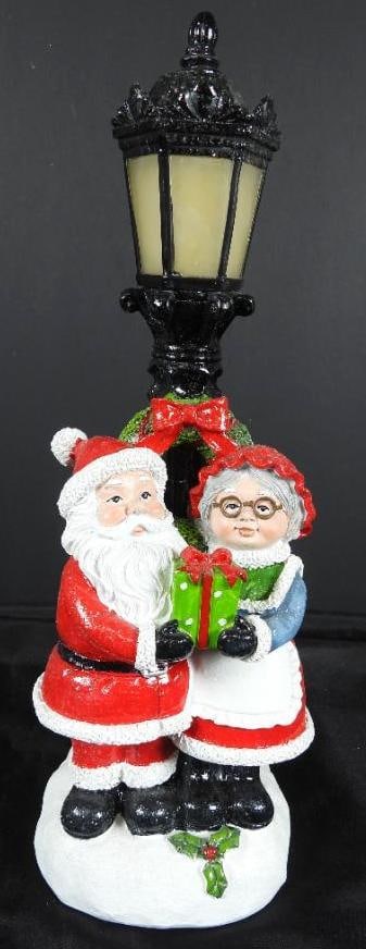 VALERIE PARR HILL LIGHTED Santa and Mrs. Claus: VALERIE PARR HILL LIGHTED Santa and Mrs. Claus at lamppost, takes 2 AAA batteries to light (not included/tested), indoor use only, 4.5"Lx4.5"Wx14"T, in styrofoam support for storing
