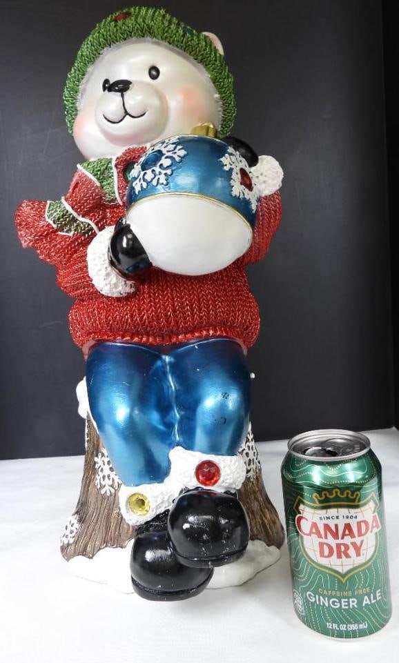 Large Polar Bear with ornament on stump (1 of 3)