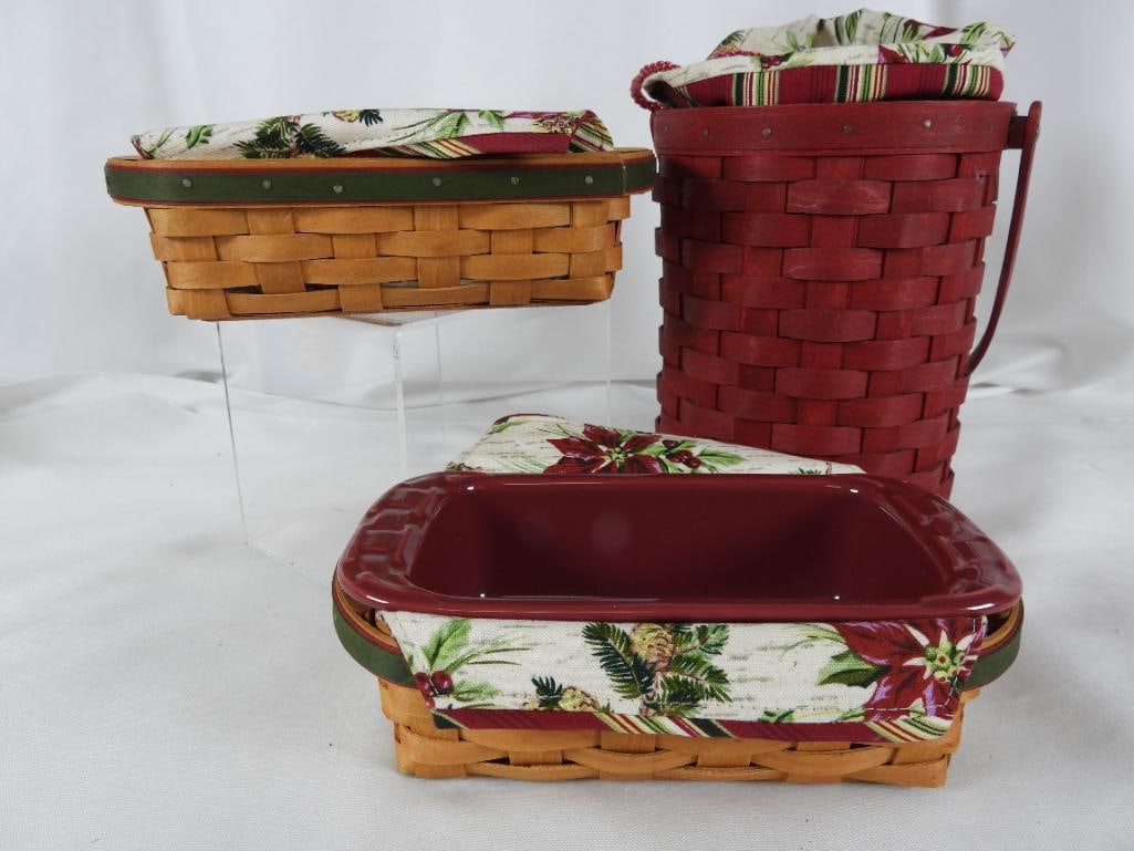LOT OF 4 LONGABERGER Christmas baskets/pottery: LOT OF 4 LONGABERGER Christmas baskets/pottery: 2006 Red Wine handled basket with reversible striped/poinsettia insert with rope closure and protector, 5.5" wide diameter and 8"T, and two holiday help