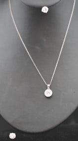 Sterling silver pendant necklace and earrings clear faceted quartz.