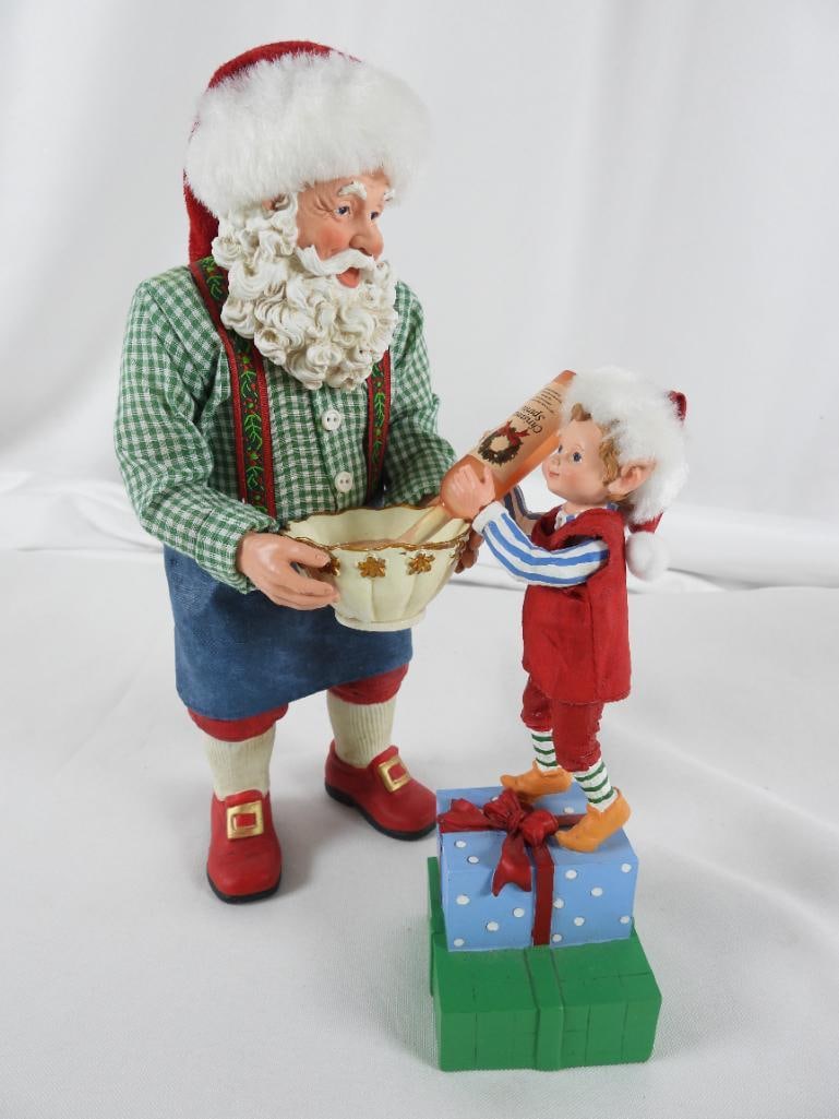 LOT O 2 POSSIBLE DREAMS CLOTHTIQUE #800689 Santa: LOT O 2 POSSIBLE DREAMS CLOTHTIQUE #800689 Santa with punch bowl, 4.5"Lx5"Wx10"T, and Elf on presents pouring Christmas spirits into bowl, 2.25"Lx2.25"Wx7"T