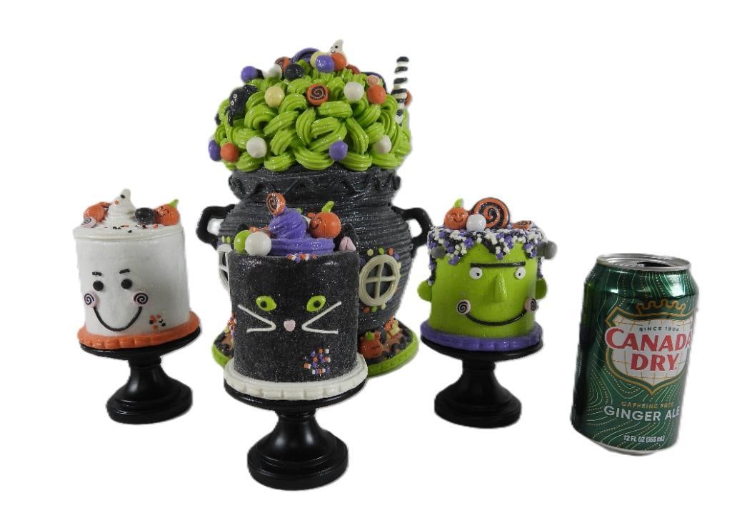 LOT OF 4 HALLOWEEN Glittery Clay Mold Cake Decor: LOT OF 4 HALLOWEEN Glittery Clay Mold Cake Decor: Large black mug battery-operated haunted house with spiders, ghost, witch and candy (no batteries included/not tested), 8.5"Lx7.5"Wx12"T; 3 cakes on b