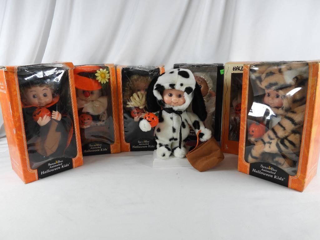 LOT OF 7 HALLOWEEN KIDS, ANIMATED, some orig boxes: LOT OF 7 HALLOWEEN KIDS, ANIMATED, some orig boxes: Kid in Dalmatian outfit with trick or treat bag, 9"Lx6"Wx13"T; Illuminated animated Kid Original MOTION-ettes of HALLOWEEN, in ghost album with trea