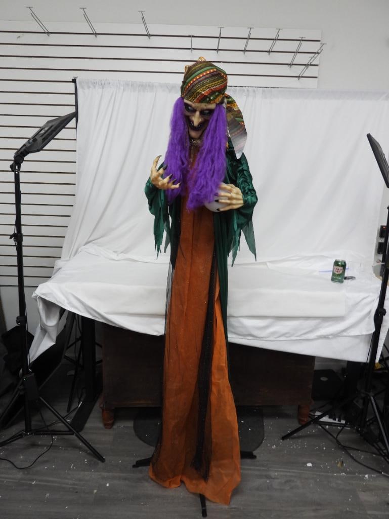 LARGE ANIMATED Standing Fortune Teller Witch, B/O: LARGE ANIMATED Standing Fortune Teller Halloween Witch, battery-operated moves and makes eerie noises (batteries not included), 15"Lx14"Wx72"T, has tripod stand that it sits on and can be pulled apart