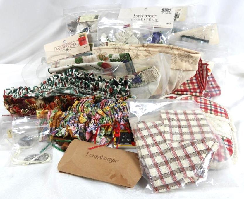 LOT OF 25 LONGABERGER CLOTH INSERTS: LOT OF 26 LONGABERGER CLOTH INSERTS AND OTHER KNICK KNACKS:10 fabric Liner of various dimensions in original packaging(2 Green, 4 fruit theme, 4 plaid) 2Lining with no packaging(Holy and summer theme)