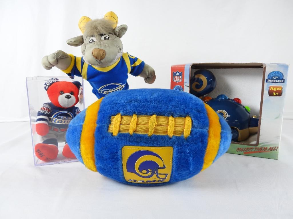 LOT OF 4 NFL ST LOUIS RAMS Collectibles: LOT OF 4 NFL ST LOUIS RAMS Collectibles: team NFL blue/yellow sport pillow; 12" tall Ram STUFFINS; 1999 TEAM PIGSKIN AUTHENTIC ST LOUIS SUPER BOWL XXXIV 2000 red bear in display case; AND NFL TEAM