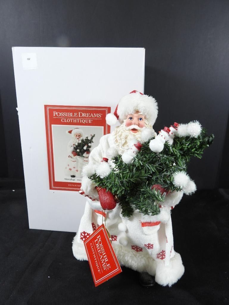 POSSIBLE DREAMS CLOTHTIQUE Snowy Wishes #6011841: Dept 56 POSSIBLE DREAMS CLOTHTIQUE Snowy Wishes #6011841 Santa holding tree with white pompoms and snowman. New in original white box. Never displayed. Dimensions 12"Tx8"Lx5.5"W