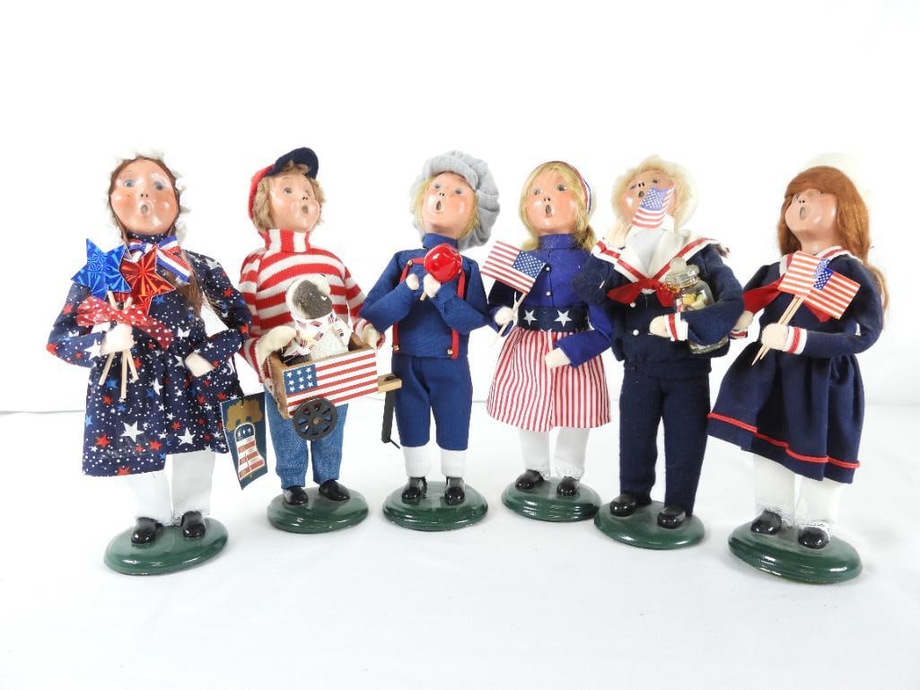 LOT OF 6 BYERS CHOICE CAROLERS WOODEN DUCK, etc.: LOT OF 6 BYERS CHOICE CAROLERS: 2020 Girl Caroler, WOODEN DUCK "Independent Isabella", BYERS SIGNED, with starred dress, 4.5"Lx3"Wx10"T; Girl caroler with star waistline and red/white striped skirt bo