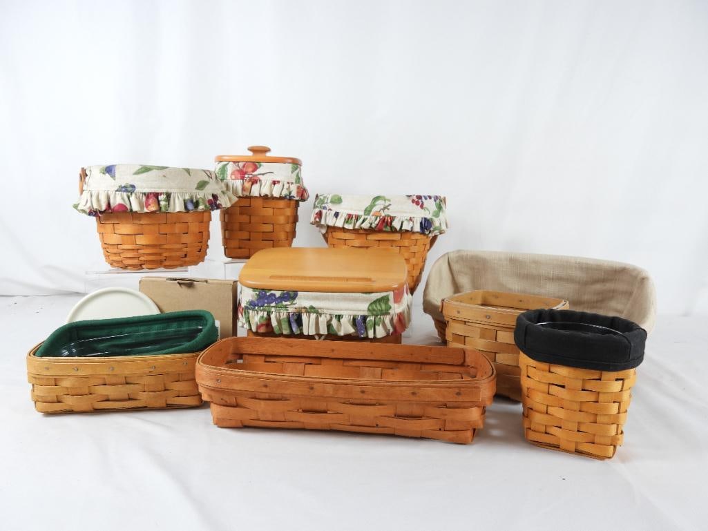 LOT OF 10 LONGABERGER BASKETS/COASTER: LOT OF 10 LONGABERGER BASKET AND COASTER: (Each has a plastic liner except 3 and item number is taken from plastic liner) 4 Baskets have the same fruit fabric liner One tall rectangular basket has no