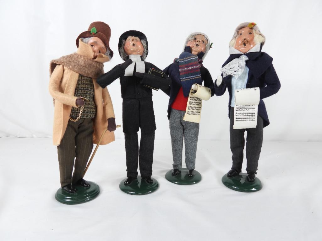 LOT OF 4 BYERS CHOICE CAROLERS BYERS SIGNED XMAS: LOT OF 4 BYERS CHOICE CAROLERS BYERS SIGNED: "Man w/Pocket Watch" dressed in brown heavy clothing for winter 2012 L4"xW4"xH14"; Man caroler in navy blue singing Noel 1988 L5"xW4"xH13"; Priest Caroler