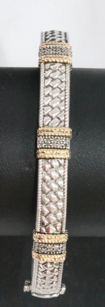 14kt gold & sterling silver DIAMOND bracelet. 24.4 grams: Hallmarked 14kt 925 AU inside. TESTS DIAMONDS 8.52 mm w x 3.6mm thick x 2-1/2" across. 6 braided 14kt gold bands with inset diamonds in-between. Braid and rope design hinged bangle with double locking