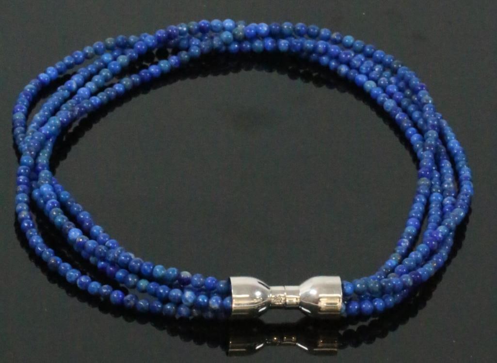 DTR Jay King designer lapis sterling necklace: DTR Desert Rose Trading company Jay King 4 strands of lapis lazuli beads with sterling silver magnet ends. Can be worn as is or with a magnetic pendant. Mearues: 18" long.