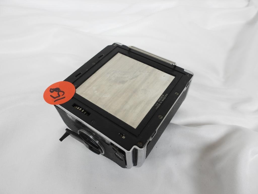 VINTAGE HASSELBLAD FILM MAGAZINE: LOT OF 1 VINTAGE HASSELBLAD FILM MAGAZINE STORAGE: 1 A12 120 Hasselblad Film magazine holder designed for medium format cameras allowing photographer to swap easily between different film stocks mid