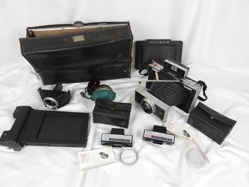 LOT OF 7 VINTAGE POLAROID CAMERA/ACCESSORIES (1 of 1)
