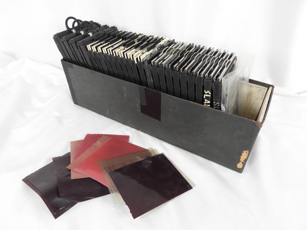 LOT OF 25 SHEET FILM HOLDERS: LOT OF 25 SHEET FILM HOLDERS AND NEGATIVES: 10 Riteway, 10 Fidelity, 3 singer, and 1 graflex film holders (all show signs of use and some age) L7.5xW5"xH1"; 1 set of negatives, film, and prints