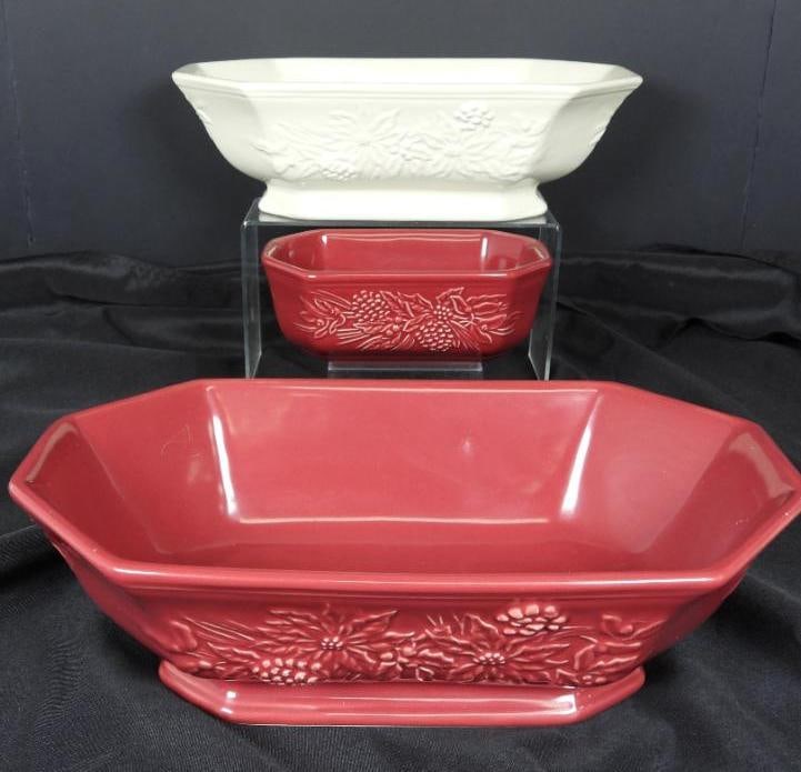 LOT OF 3 LONGABERGER POTTERY CHRISTMAS SERVING: LOT OF 3 LONGABERGER POTTERY SERVING BOWLS: 2 Octagonal serving bowls in red and ivory with poinsettia designs on their faces L13"xW7.5"xH4"; 1 Mini octagonal serving dish in red with similar