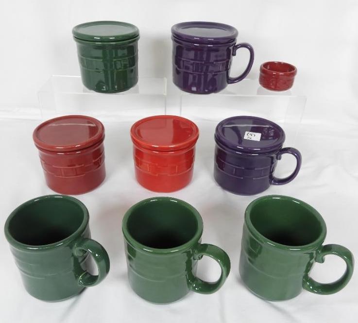 LOT OF 8 LONGABERGER POTTERY SOUP MUGS AND MUGS DISH: LOT OF 9 LONGABERGER POTTER MUGS + GARNISH DISH: 2 Green coffee mugs L5"xW3.5"xH4"; 5 Soup/coffee mugs with matching lids in colors of purple, green, red, and dark red L6"xW4.5"xH4"; 1 Small garnish/c
