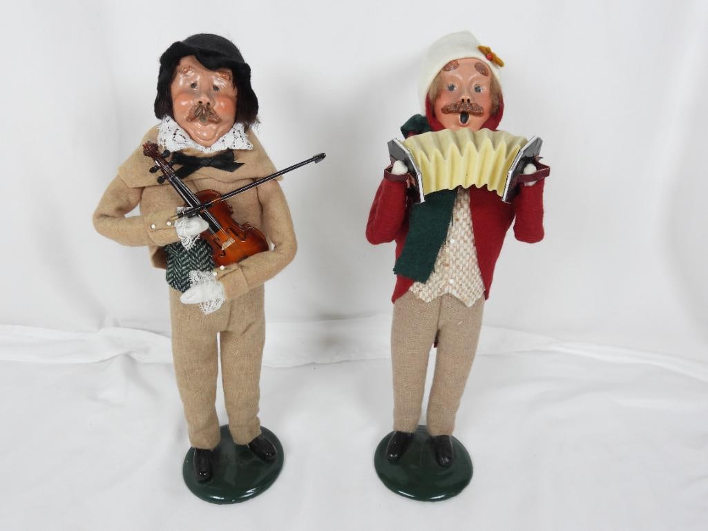 LOT OF 2 BYERS CHOICE CAROLERS limited edition: LOF OF 2 COLLECTABLE BYERS CHOICE CAROLERS BYERS SIGNED: 1 Caroler holding violin L5"xW4"xH13" 89/100 1989; 1 Caroler playing the accordion L5"xW4"xH14" 33/100 1991