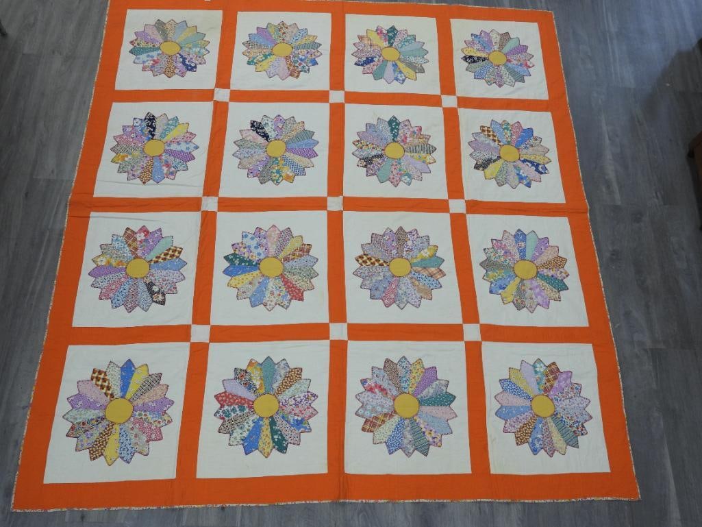 Vintage Hand quilted and machine Quilt Floral Daisies: DUTCH STYLE BLANKET: 1 Blanket in orange and off white with square sectioned vignettes of patterned daisies on its front and a pattern of wildflowers covering the back L77"xW77"