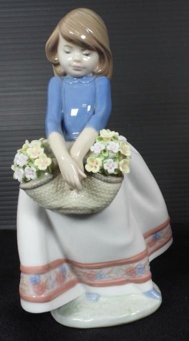 LLADRO "MAY FLOWERS" Porcelain Girl Figurine with basket of flowers In original box: Made in Spain. Comes in original box. No damage. EXCELLENT CONDITION . $710 on Lladro Website. Glossy porcelain with a large basket of yellow daisies. Original version. Measures: 6.6" high x 2.75" wid