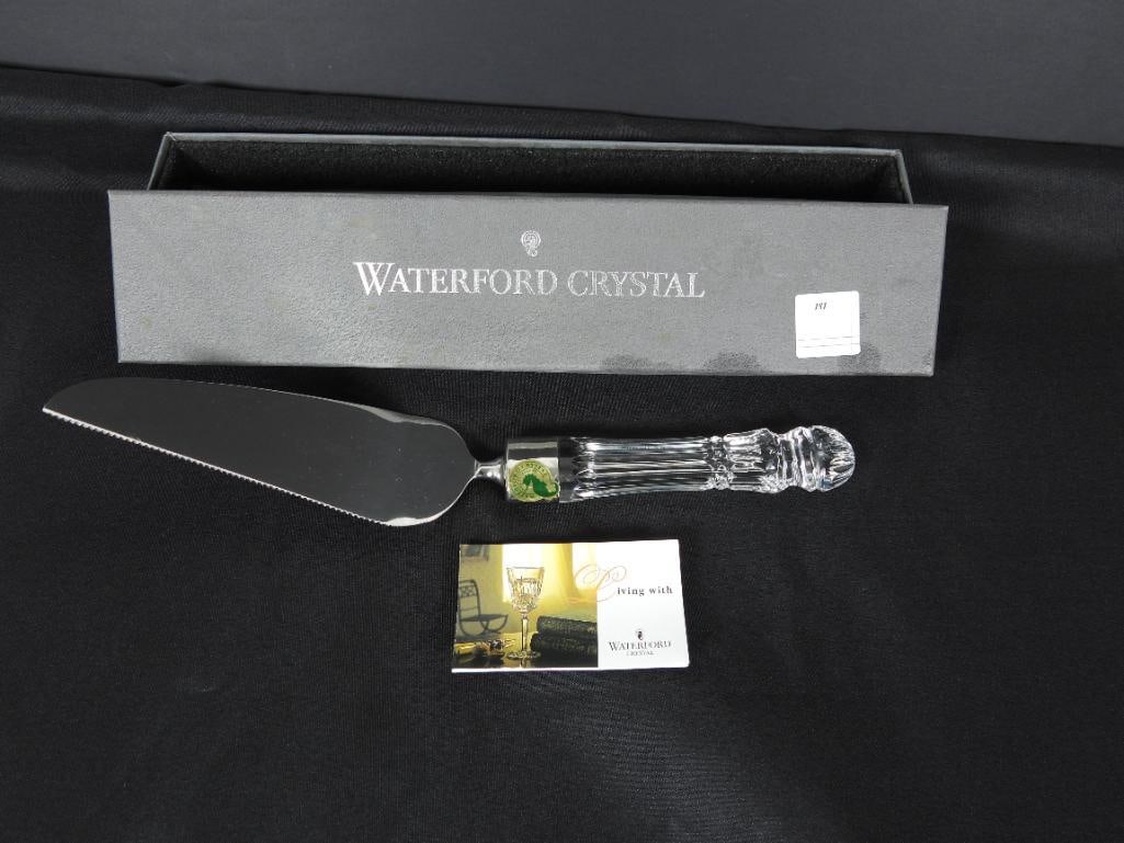 NEW in the box WATERFORD Lismore Crystal Cake Server: New in the box. Box has some discoloration. Made in Ireland. Measures: 11.5" long. Separated edged for perfect cutting. Stainless steel blades.