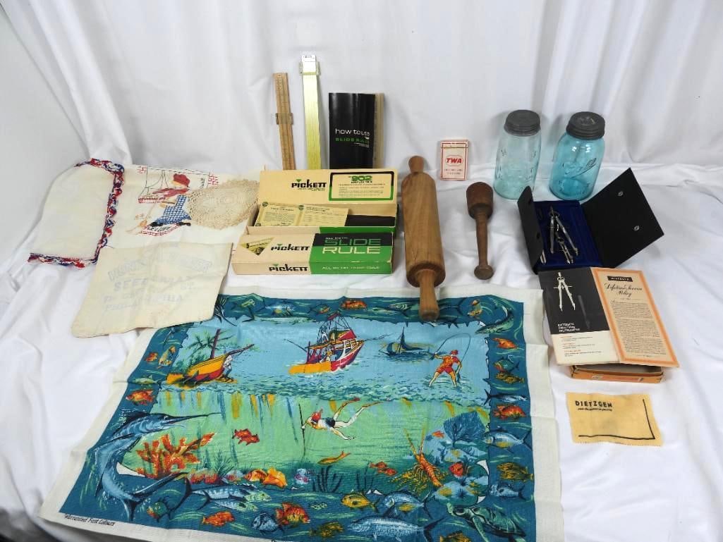 Lot of Primitives and antiques: Includes blue mason jar PATENT NOV. 30TH 1858 embossed, antique #9 blue mason jar, wood rolling pin, wood grain pounder, 1946 Sealed TWA Playing cards, wood slide ruler, doily, embroidered towel and n