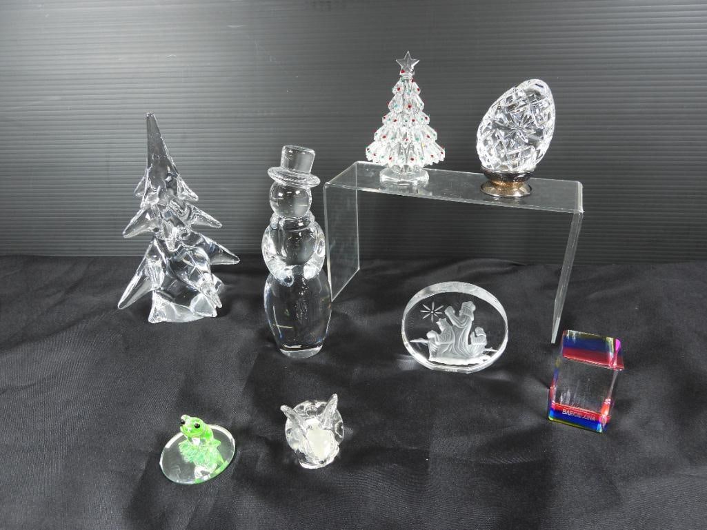 Lot of 8 Glass seasonal decor: Included are 2 Christmas trees with one being clear glass and the other with a star and "ornaments"; also included is a large snowman, a vignette of the three wise men, a Barcelona souvenir, a green f