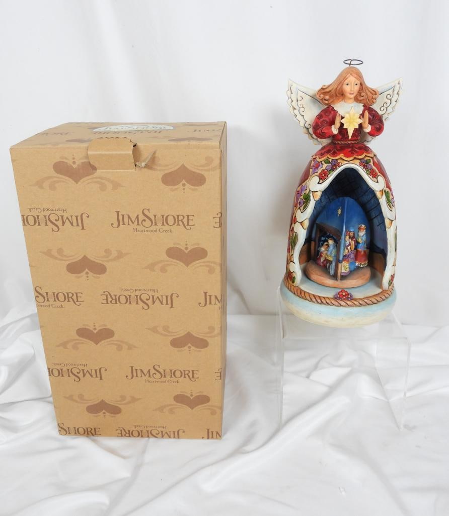 Jim Shore music box "The Child of Mary" in Box: Figurine depicts a scene from the Christmas story, when the key is turned it plays the tune "Away in a Manger" with the center piece spinning to display 3 unique scenes 2008 #4012675