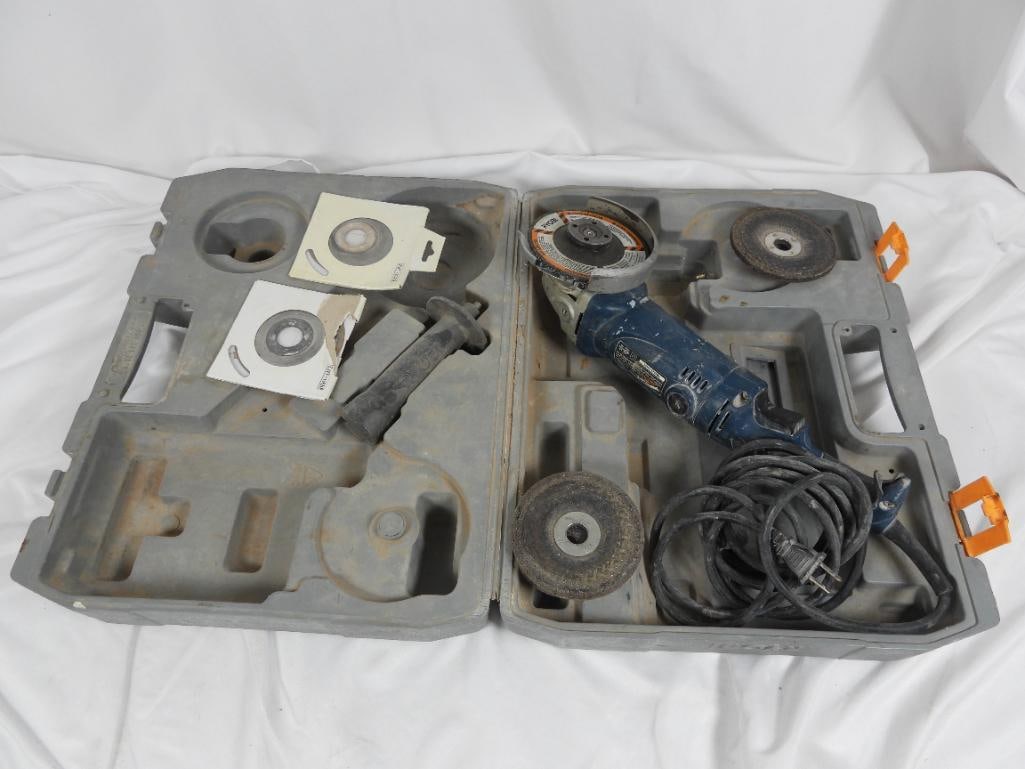 Ryobi angle grinder: Possible model of AG452 this Ryobi is used but in good condition with 6 grinding plates and an additional handle for stability