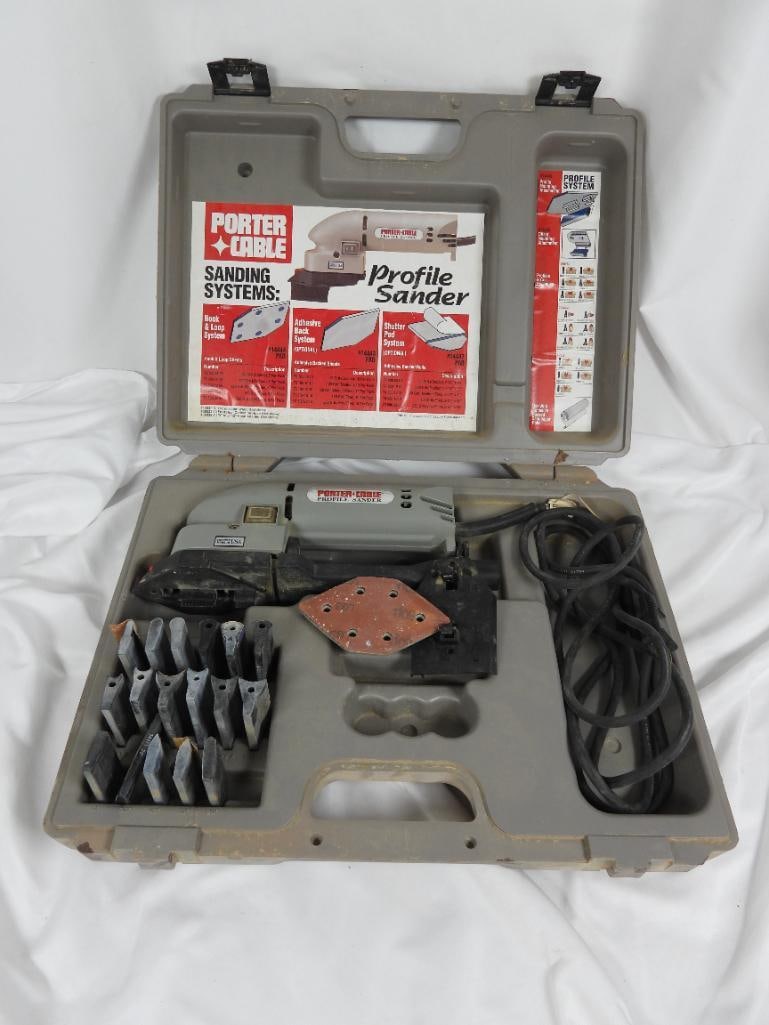 Porter Cable profile sander: Likely model 444 this slightly used sander comes in its original carrying case with a variety of sanding pads for flat surfaces and angled corners