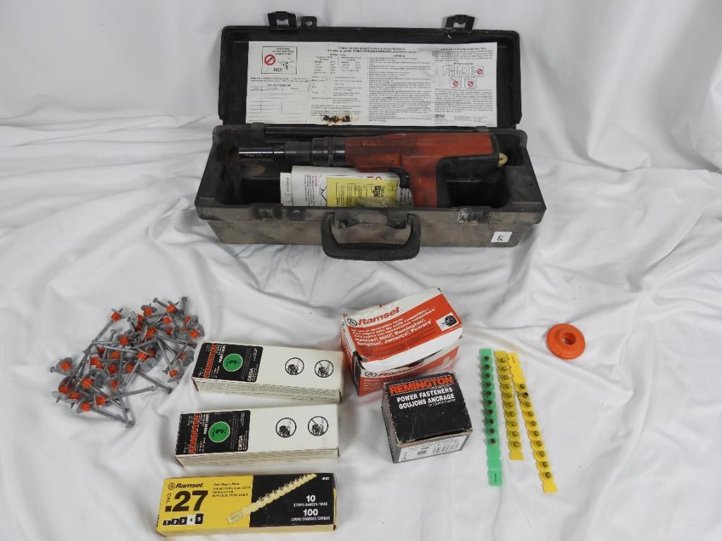 Remington 496 Powder Actuated Tool: .27 Caliber fastening gun, shows use, propels fasteners, included with kit, for fastening materials to concrete or steel